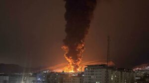 Smoke rises following an Israeli attack on the Sharan Oil depot in Tehran, Iran, on March 8, 2026. (Photo via social media)